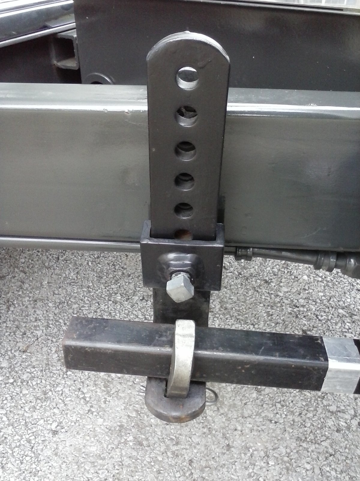 L-Bracket and spring arm.jpg