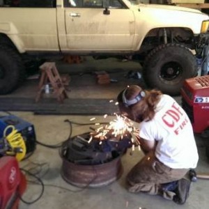 Gf working on rear mounted winch for her yota she built